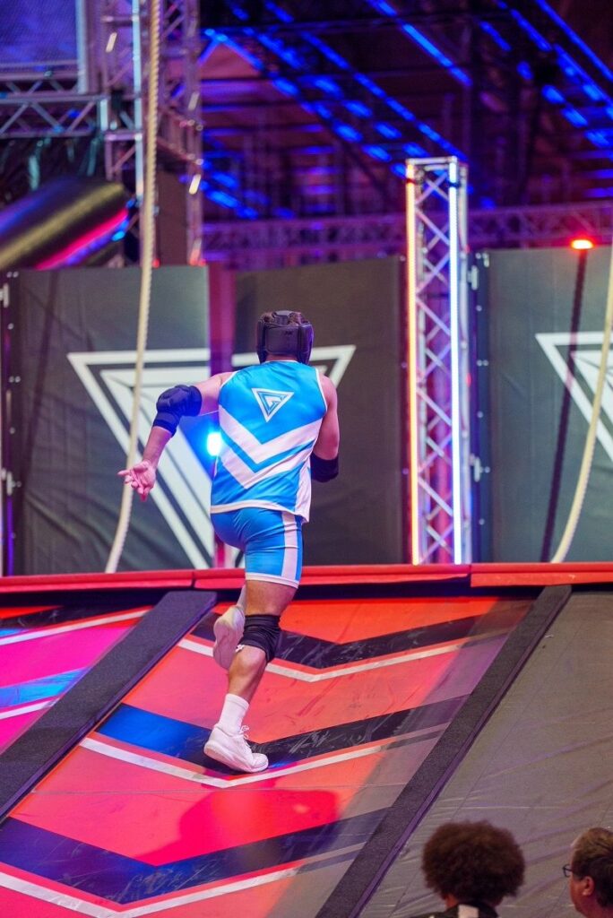 Back view of a blue Gladiators Experience contender kit in action